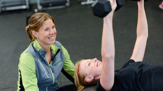 Two ladies working out at the gym
