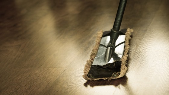 mop cleaning a wooden floor