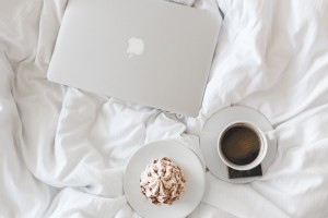 A bed with coffee and