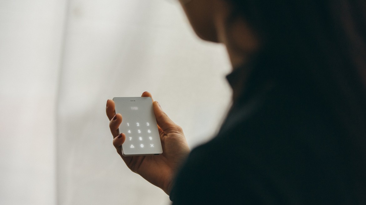 Image of someone holding the light phone