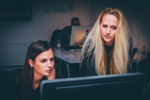 Two ladies looking at a computer screen