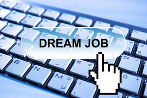 A computer keyboard with a button saying Dream Job