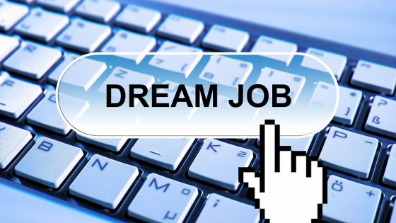 A computer keyboard with a button saying Dream Job