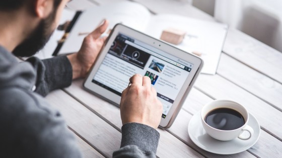 Man doing business work on an iPad