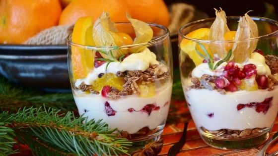 Two glasses with fruit and yoghut