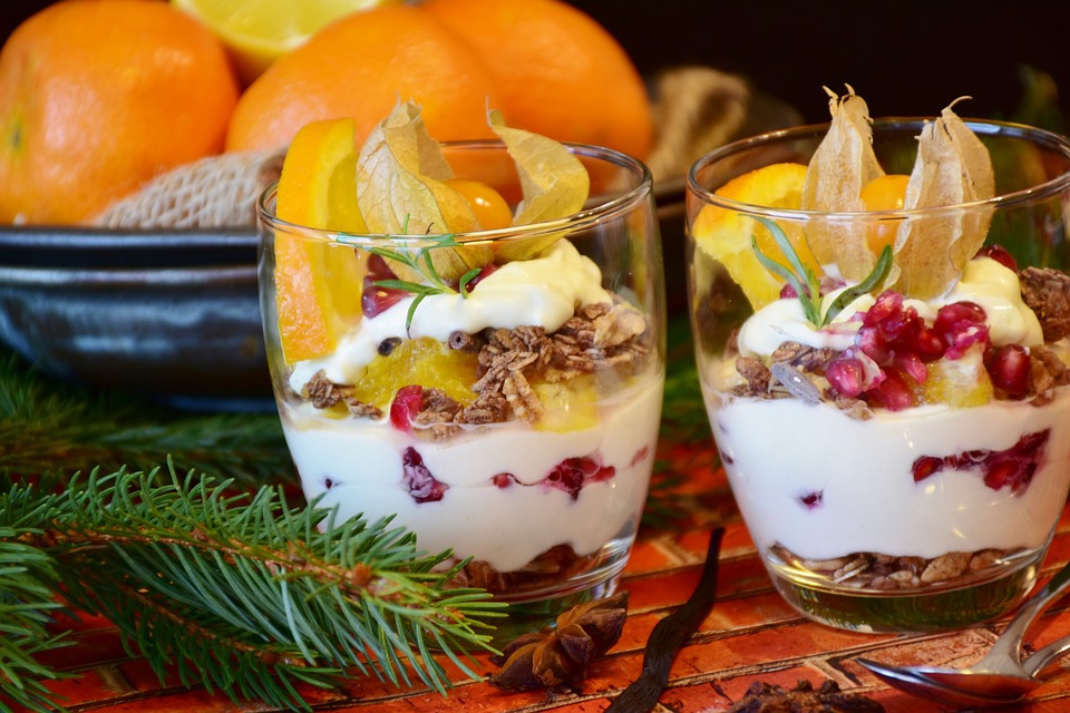 Two glasses with fruit and yoghut