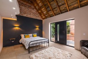 bedroom-at-sustainable-luxury-the-616-venue