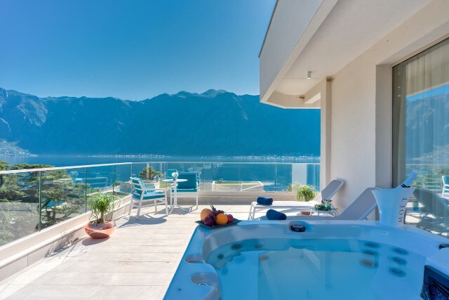 Hyatt Regency Kotor Bay premium guestroom with an outside hot tub