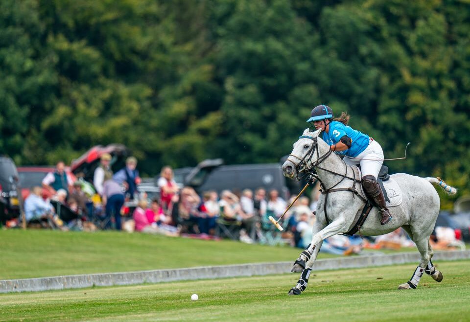 female-polo-player-on-a-pony-at-Stonehenge-Polo-Festival