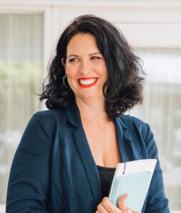 Professional headshot of a woman smiling at the camera.