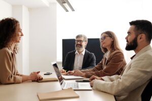 People in the office chatting and being happy