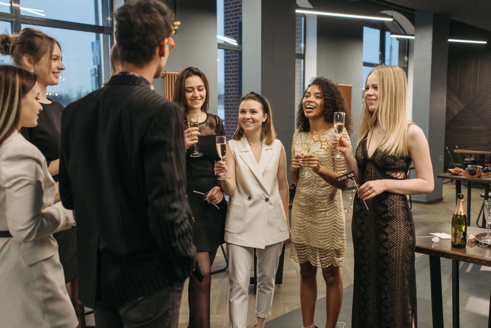 Colleagues at a networking event talking to each other