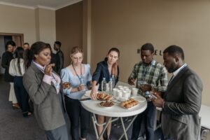 professionals networking with snacks