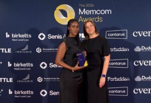 two women collecting awards