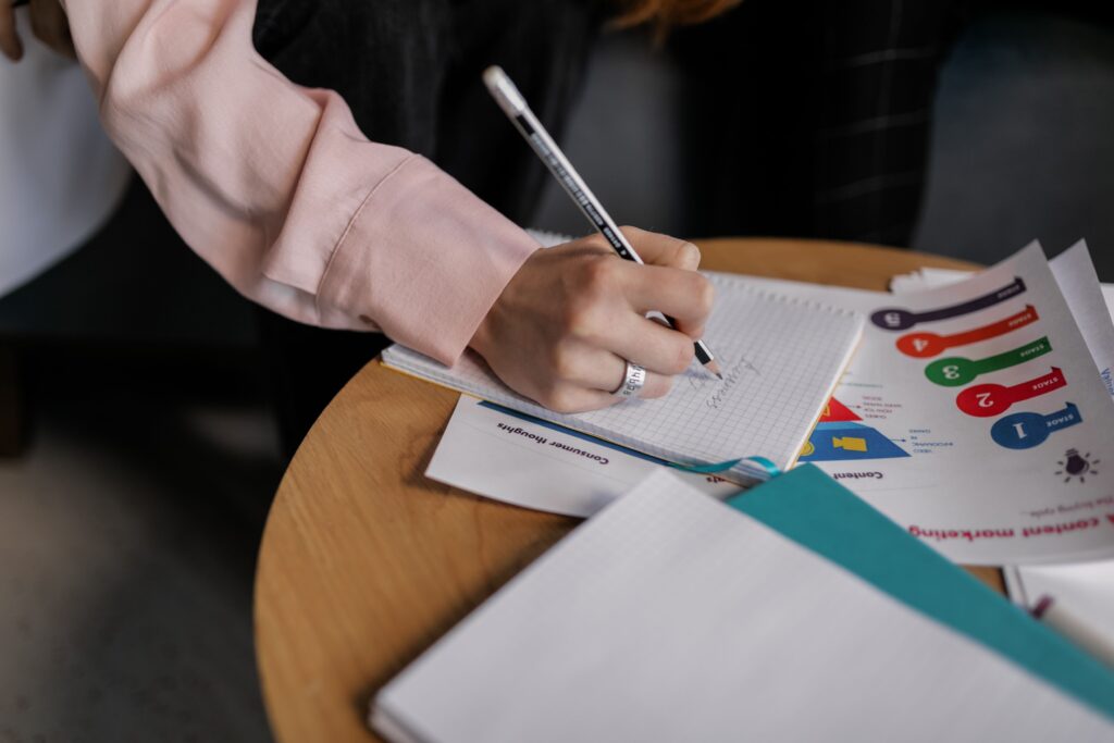 taking notes in a meeting